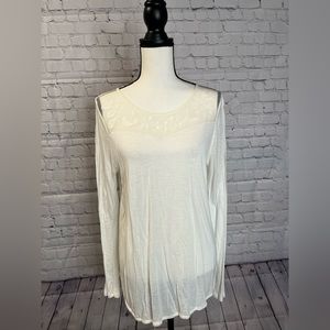 Long sleeve top with sheer sections